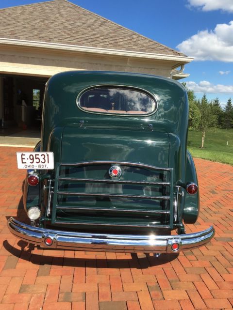 1937 packard 1501 touring sedan. lwb. aaca first place