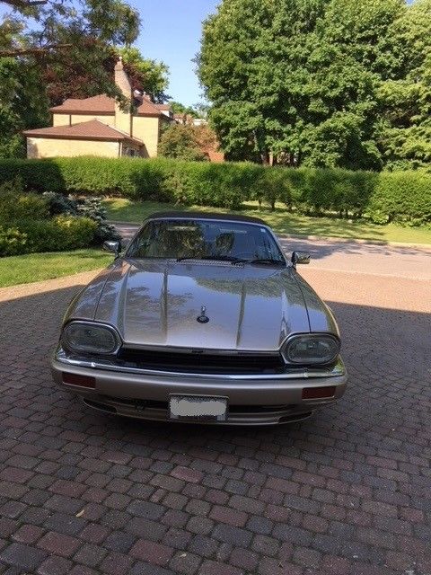 1994 jaguar xjs convertible in gold colour with brown soft top