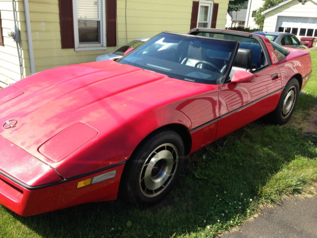 1985 red corvette, 4speed w/overdrive, full power, targa top