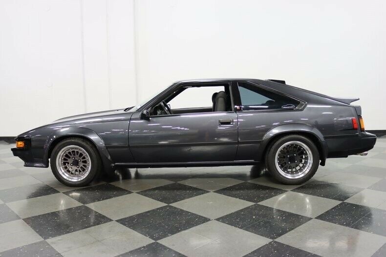 very clean w/ 4,500 miles on complete restoration, rebuilt 2.8l, 5 speed, wow!
