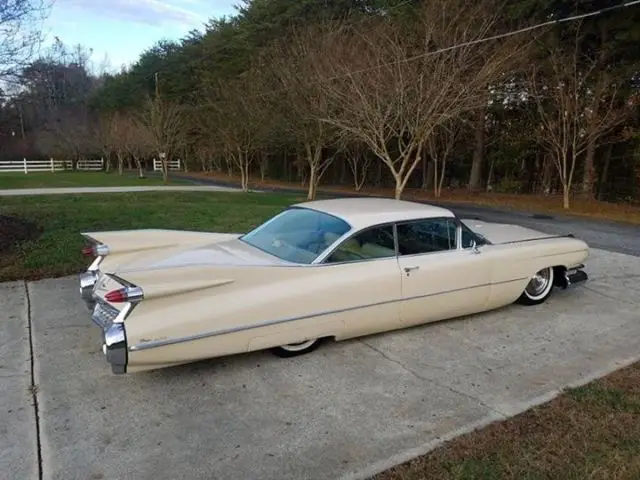 beige/tan cadillac deville with 0 miles available now!