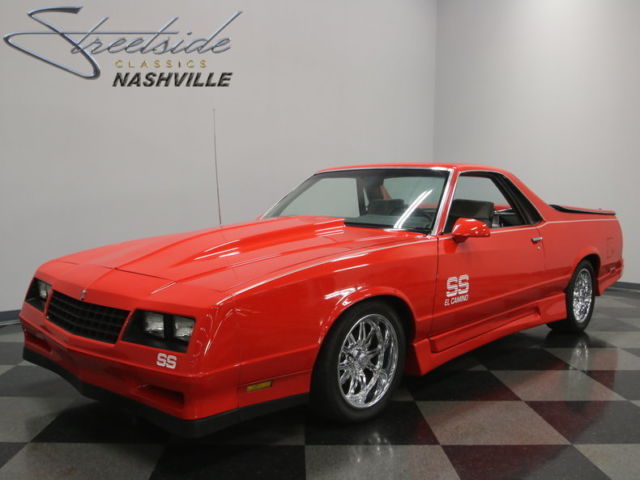 super slick torch red paint, 350ci motor w/ 4 bolt main, a/c, nicely restored!