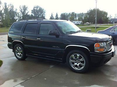 2006 gmc yukon denali dvd/nav/loaded black with tan leather for sale in fargo, north dakota