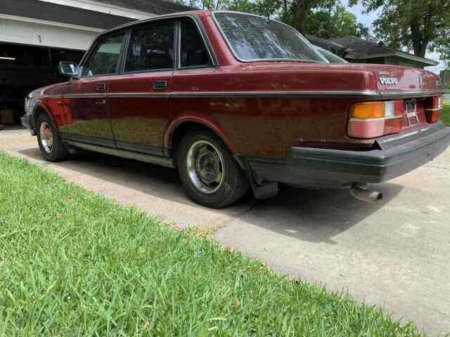 1990 volvo 240 sedan red rwd manual base