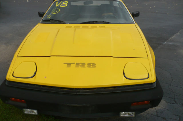 1981 triumph tr8 convertible. nicely repainted yellow 8 cyl
