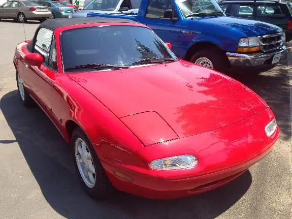 1990 red mazda mx-5 miata convertible