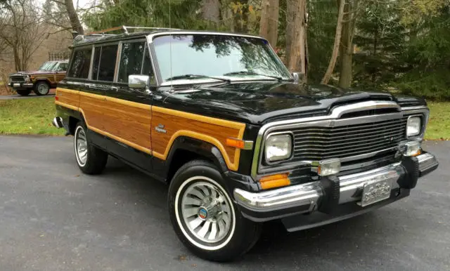 1984 grand wagoneer recently refinished classic black exterior with low miles