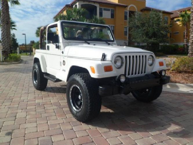 01 jeep wrangler sahara~rubicon lift on 31" wheels in sarasota, fl