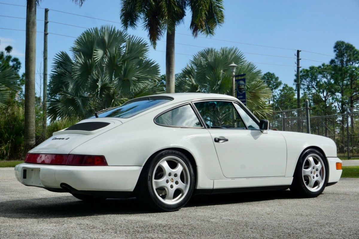 964 c2 coupe - factory lsd - grand prix white / silk gray - 5 speed manual