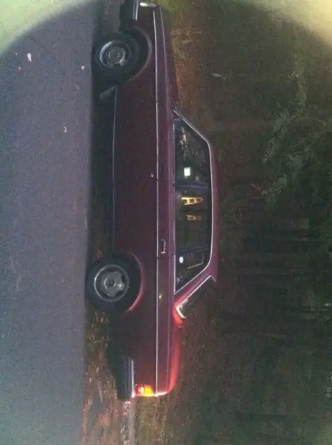 vintage 1983 burgundy volvo 4 door sedan