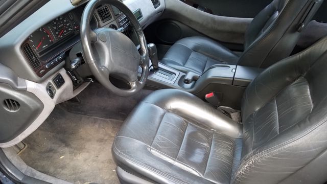 two 1992 subaru svx lsl awd cars, plus 2 extra doors