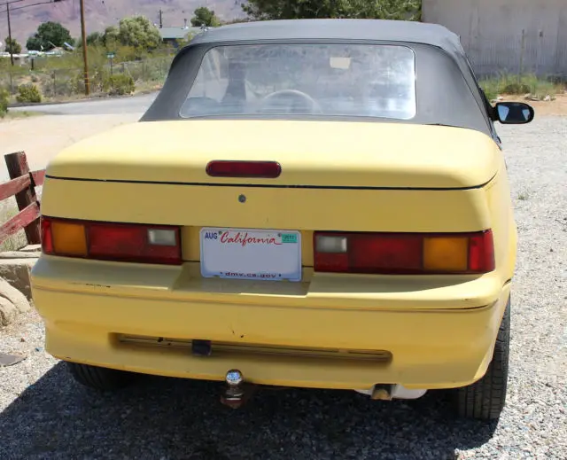 1991 geo metro convertible yellow