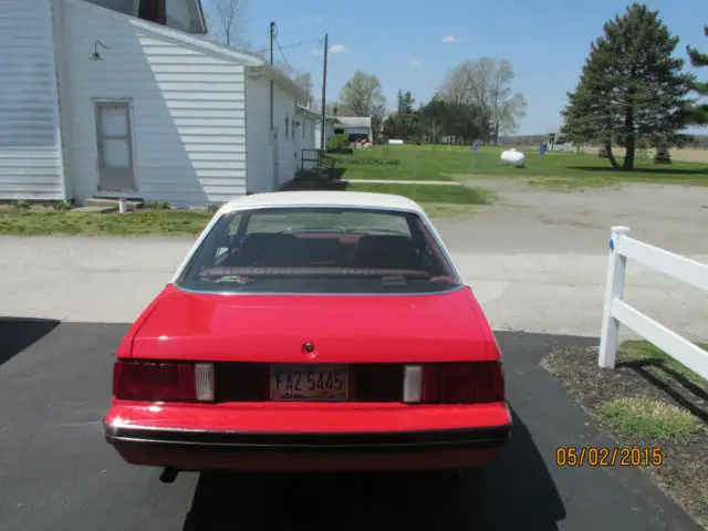1979 ford mustang (fox body) white over red