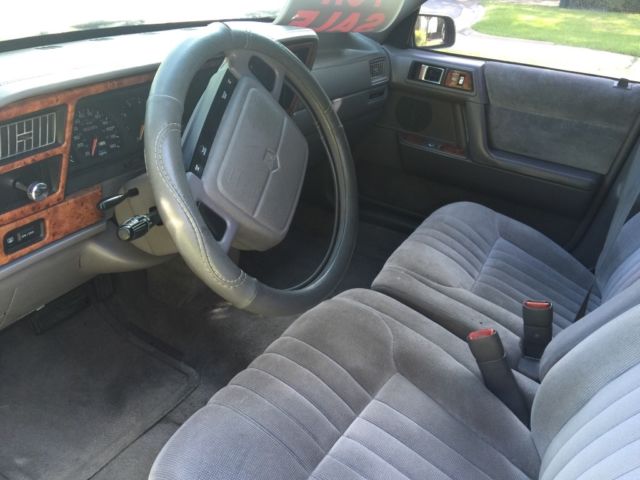 ** 1994 chryler lebaron , 82k miles, silver , runs good, new stereo & tires **