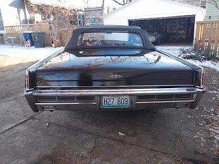 66,1966 lincoln continental 4 door convertible
