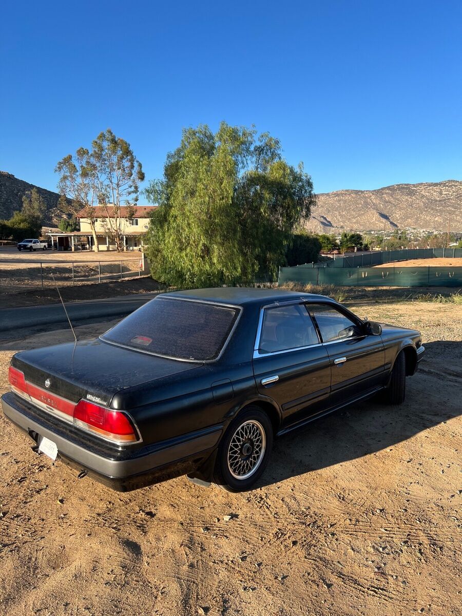 1992 nissan laurel sedan black rwd manual