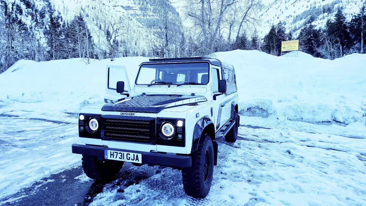 classic vintage land rover defender 110 for off-grid camping search & rescue
