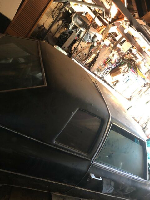1975 cadillac coupe deville black