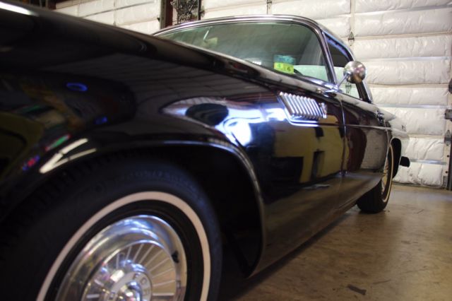 classic 1955 ford thunderbird hardtop/convertible. both tops