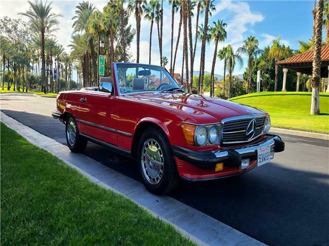 red mercedes-benz 560 sl series with 143,858 miles available now!