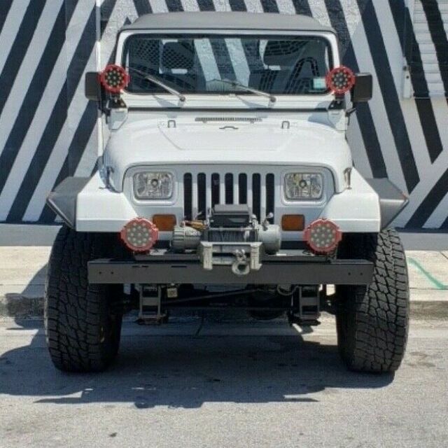 1989 jeep wrangler soft top. too much to list. fresh engine