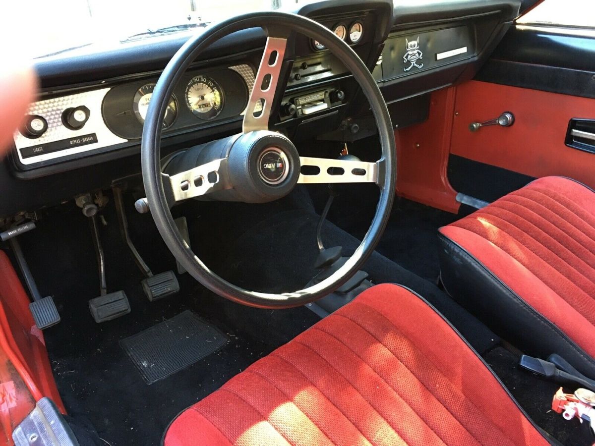 1976 amc gremlin red & white low mileage runs good very clean inside and outside