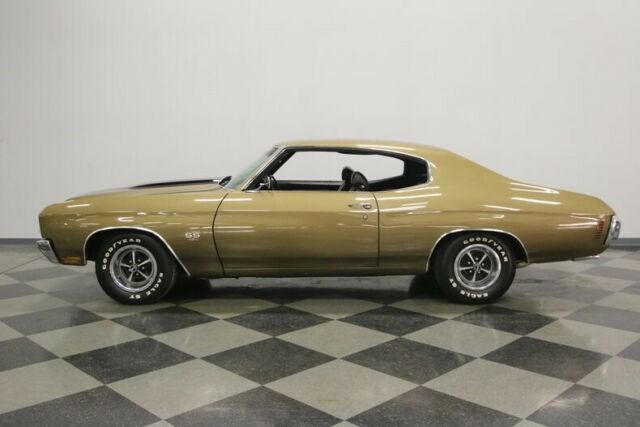 correct 70 champagne gold, big block 454, buckets w/ console, ss dash w/ tach!
