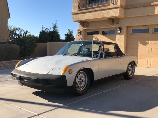 correct silver with black. very original solid 914. still fuel injected. interio