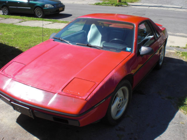 1986 fiero 2.5 4 cyl. runs drives great needs paint fun as-is or v8 conversion?