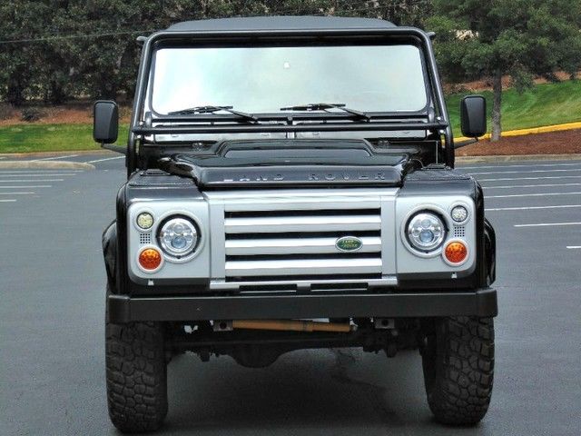 adventuremotorcars presents restored 1994 black defender 90 soft top!