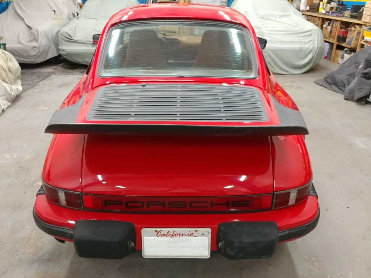 1975 porsche 911 coupe - guards red. really nice exterior and interior