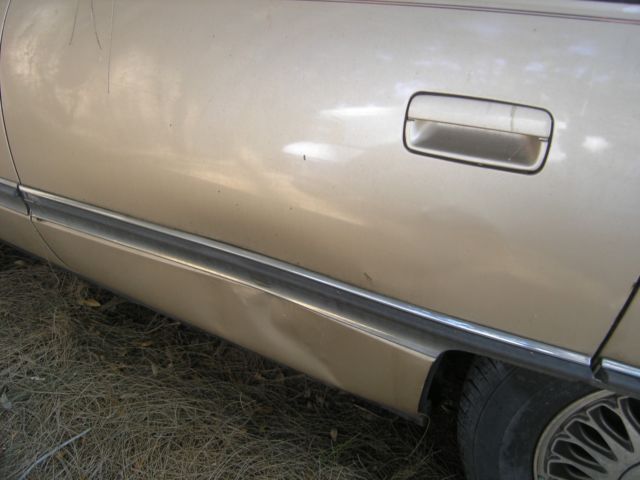 gold 1994 cadillas dts seville