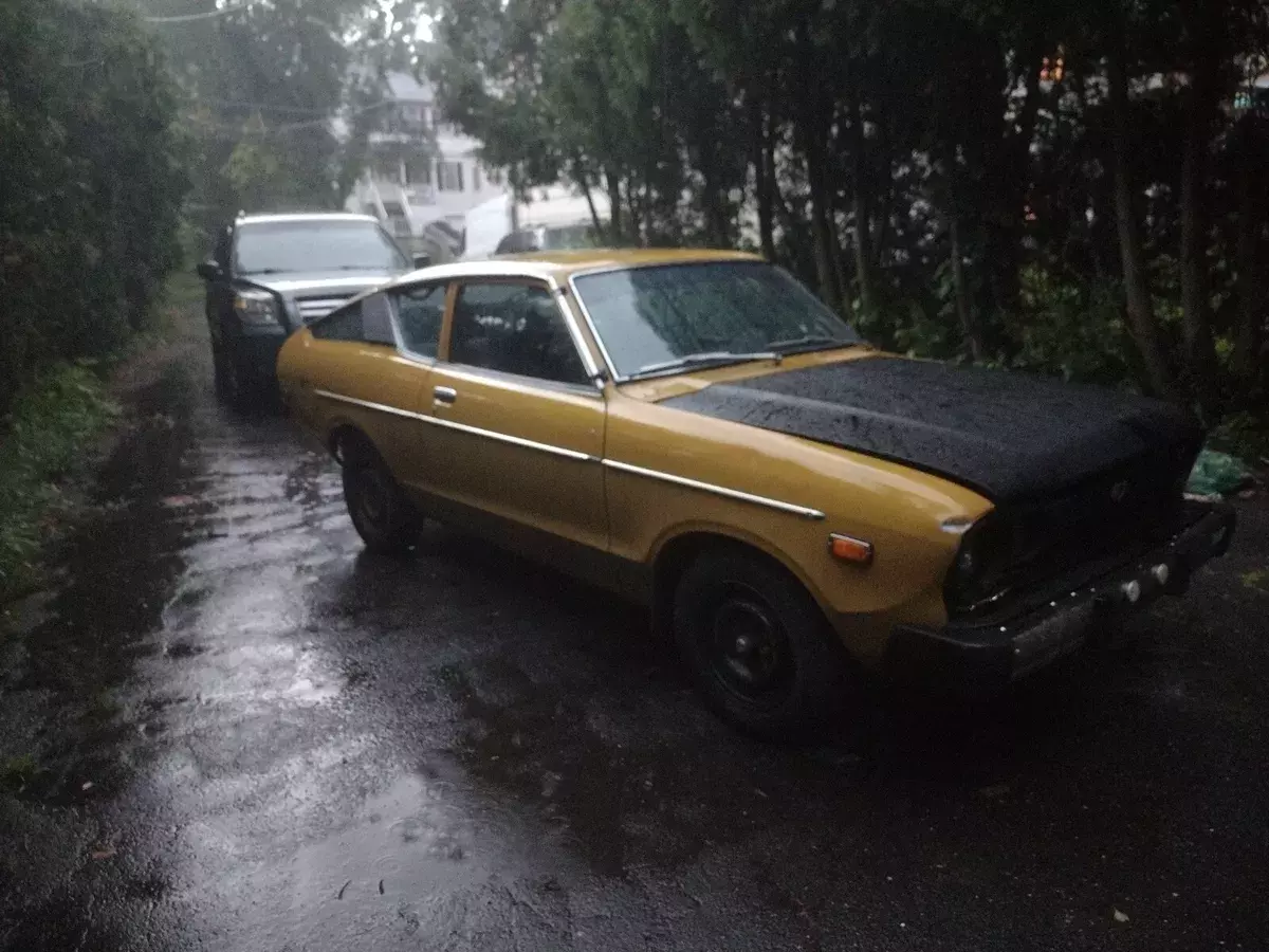 1979 datsun b-210 hatchback yellow