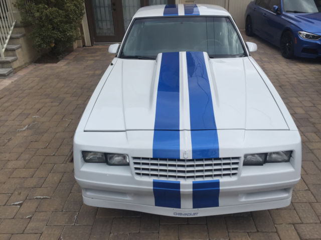 white and blue 1984 chevrolet monte carlo 5l v8 2 door coupe - under 60k miles !