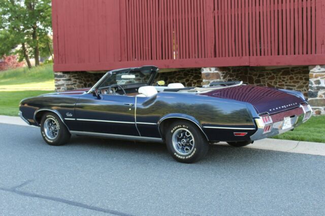 good,fun driver-rocket 350-auto-p.s.-power disc brakes-a/c-royal blue iridescent