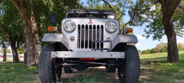 1900 mitsubishi jeep suv grey 4wd manual j55