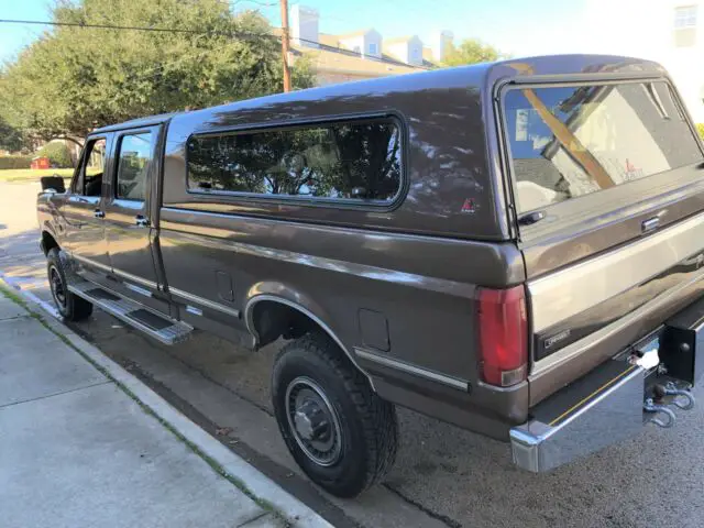 1993 f-350, 135,000 mi., 7.3l diesel, crew cab, long bed 4x4 with canopy