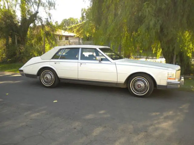 1985 beautiful cadillac seville white vinyl top, sedan, 163,380 cherry miles