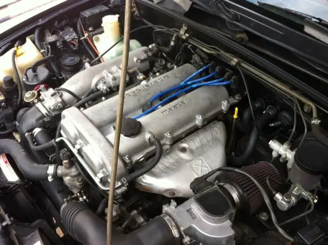 mazda miata, 5 speed manual, black and tan. p/w ,a/c, p/s
