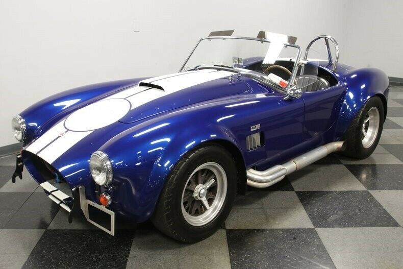 classic vintage quick jacks knock off wheels side pipes roadster soft top