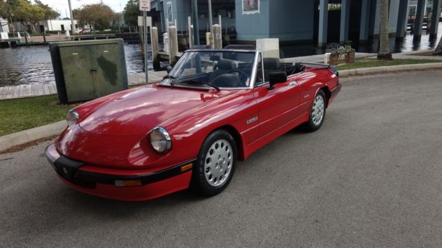 alfa romeo spider, 1987 california car. red quadrifoglio w/ grey interior