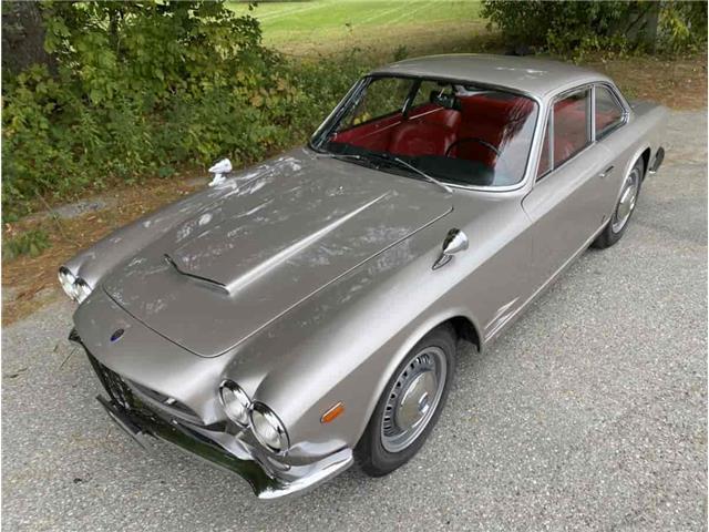 1963 maserati sebring silver with a red interior