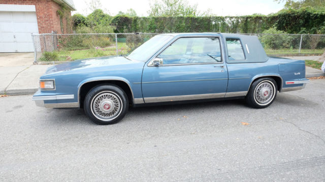 no reserve! one owner, only 23,000 miles, clean carfax, leather, carriage roof!!