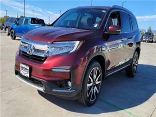 2021 Honda Pilot touring w/rear captain's chairs