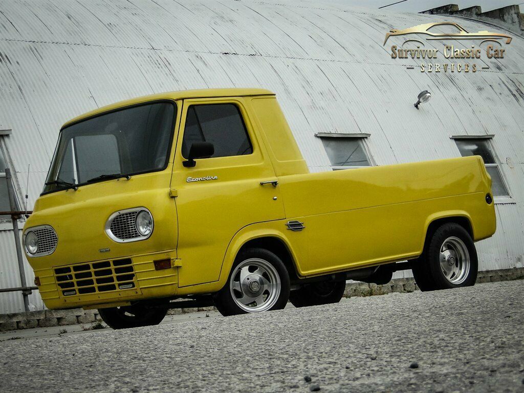 yellow ford econoline with 763 miles available now!