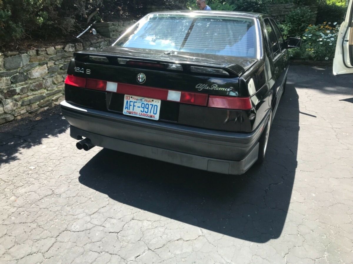 low miles! clean! awesome vehicle. luxury alfa!