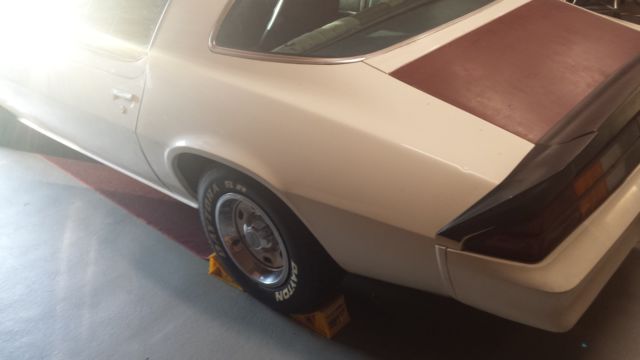 1981 camaro 6 cylinder 3 speed original. white exterior with dark blue interior