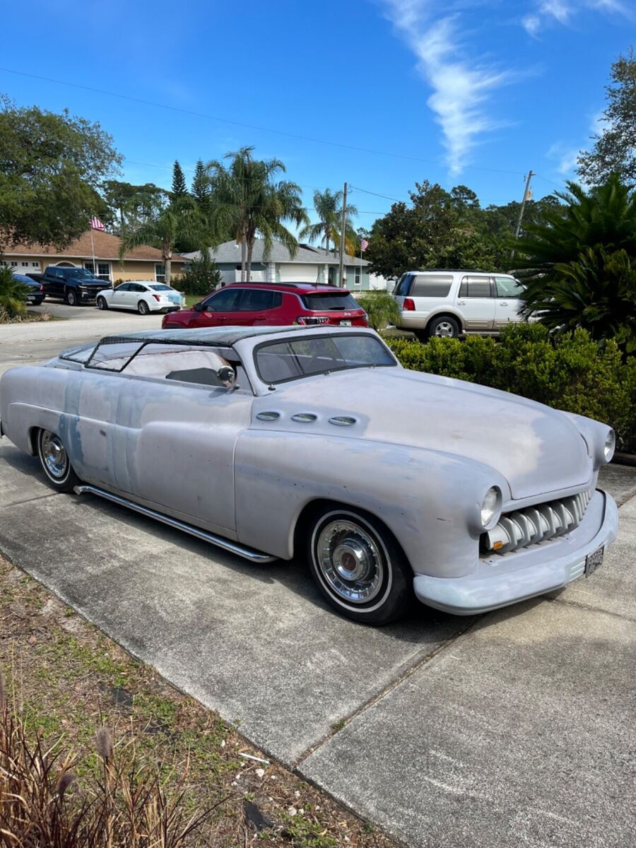 1951 mercury a cool 2 dr conversion with a custom carson style top. has a 351m m