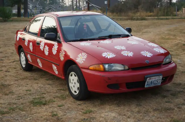 1993 eagle summit dl 1.8l 16 valve, red w/daisies