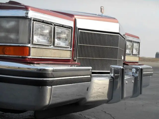 1983 cadillac coupe de ville 65040 miles 2 owners firemist red with red leather